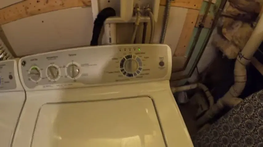 Pipe slope detail used in basement laundry plumbing