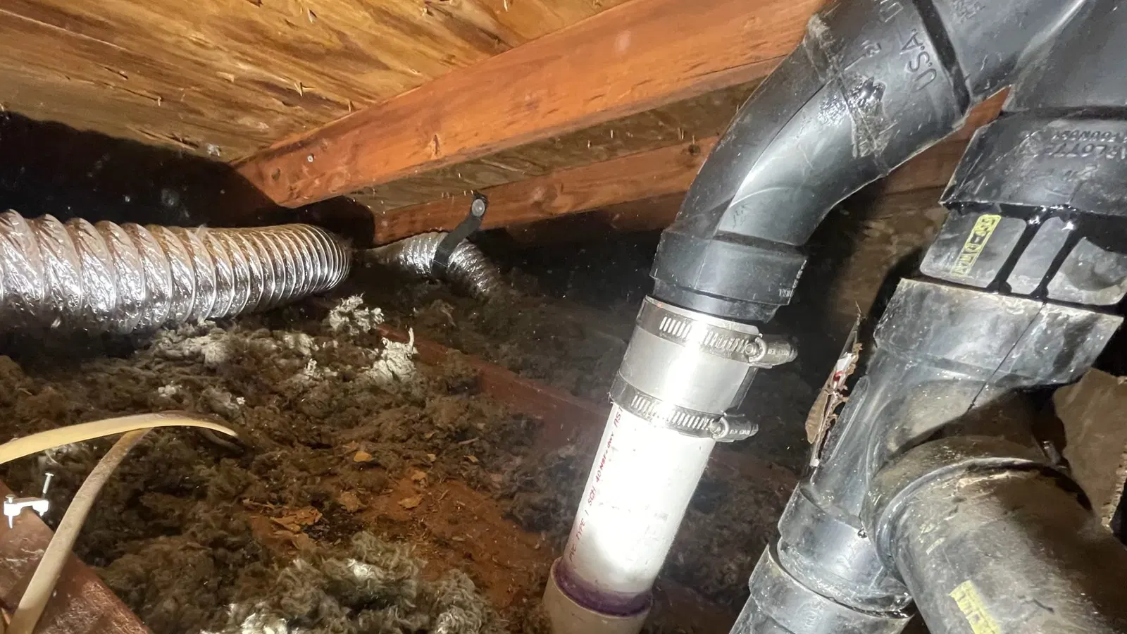Basement plumbing venting with focus on drain pipe routing