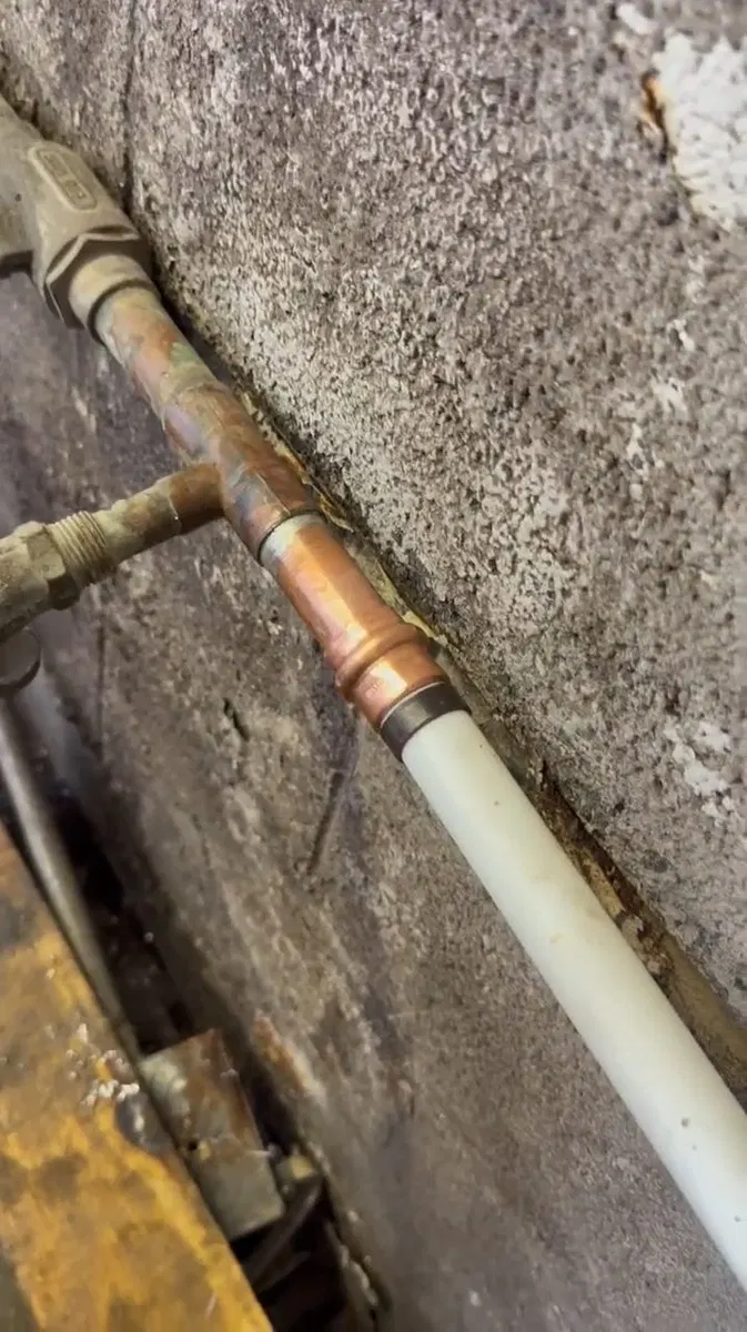 Close view of water line routing for commercial water line repair