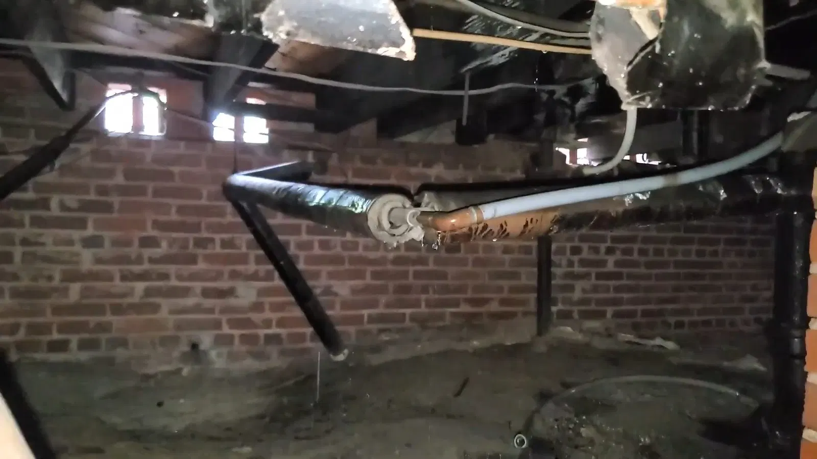 Crawl space leak inspection with focus on drain pipe routing