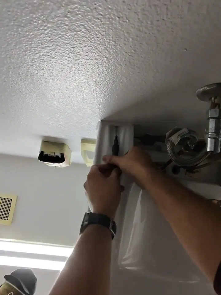 Mounting hardware during faucet and sink repair
