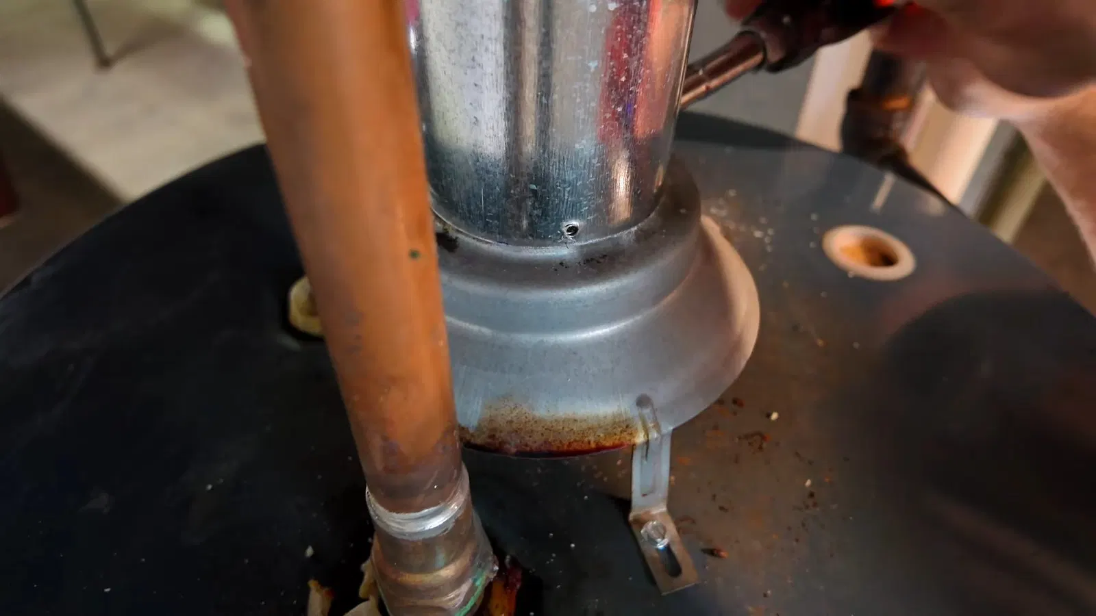 Gas water heater replacement showing temperature pressure valve