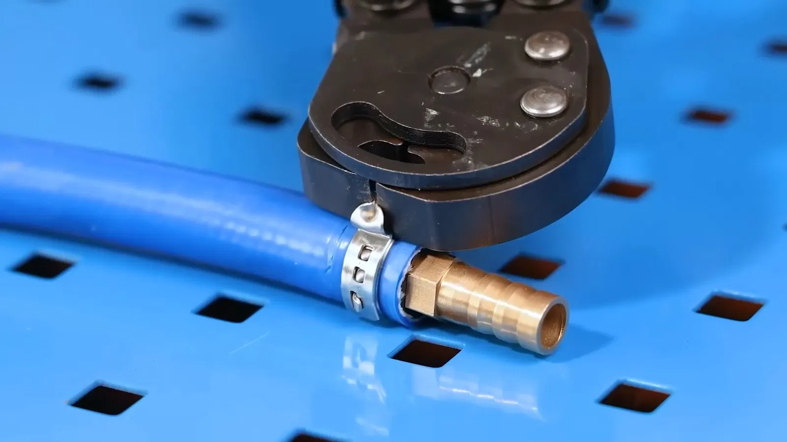 Close view of workbench tool layout for professional plumbing tools