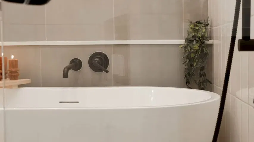 Close view of fixture supply lines for shower bathtub installation