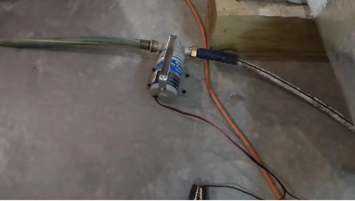 Close view of sump basin for sump pump installation repair