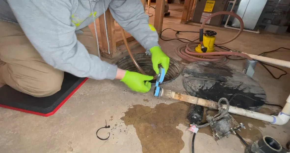 Close view of sump basin for sump pump repair