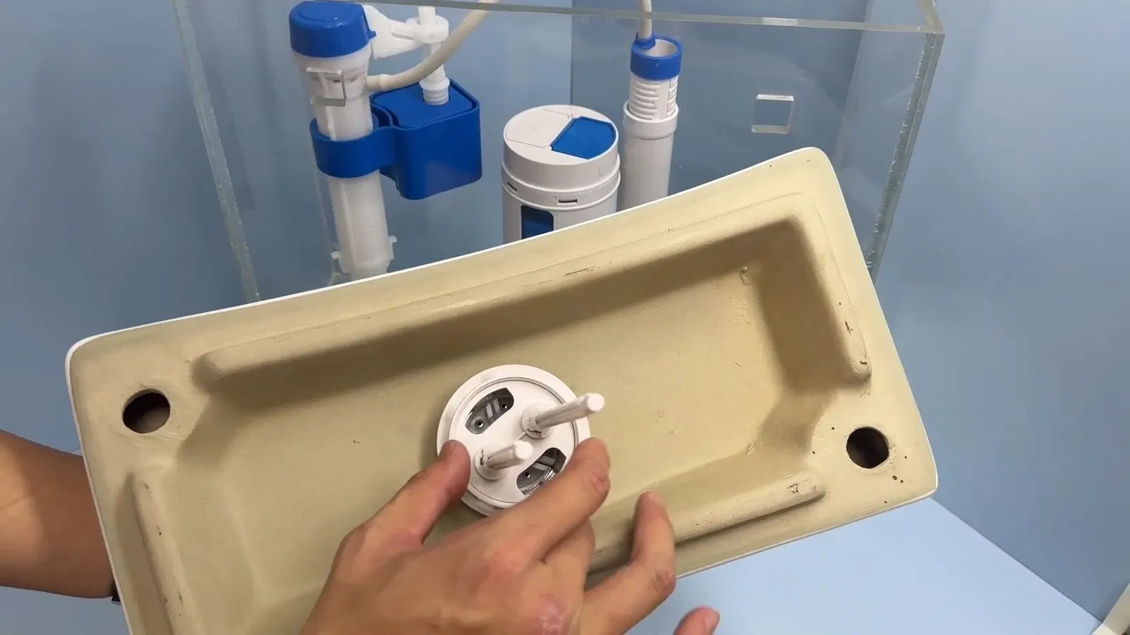 Toilet tank repair kit showing flush valve