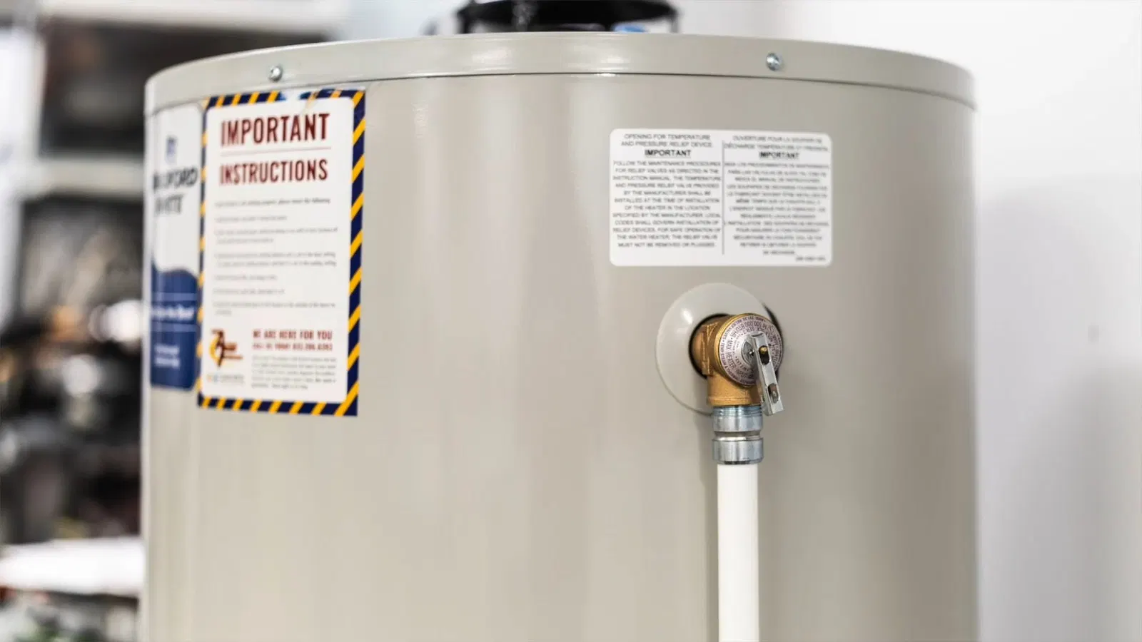 Water heater repair showing vent connection