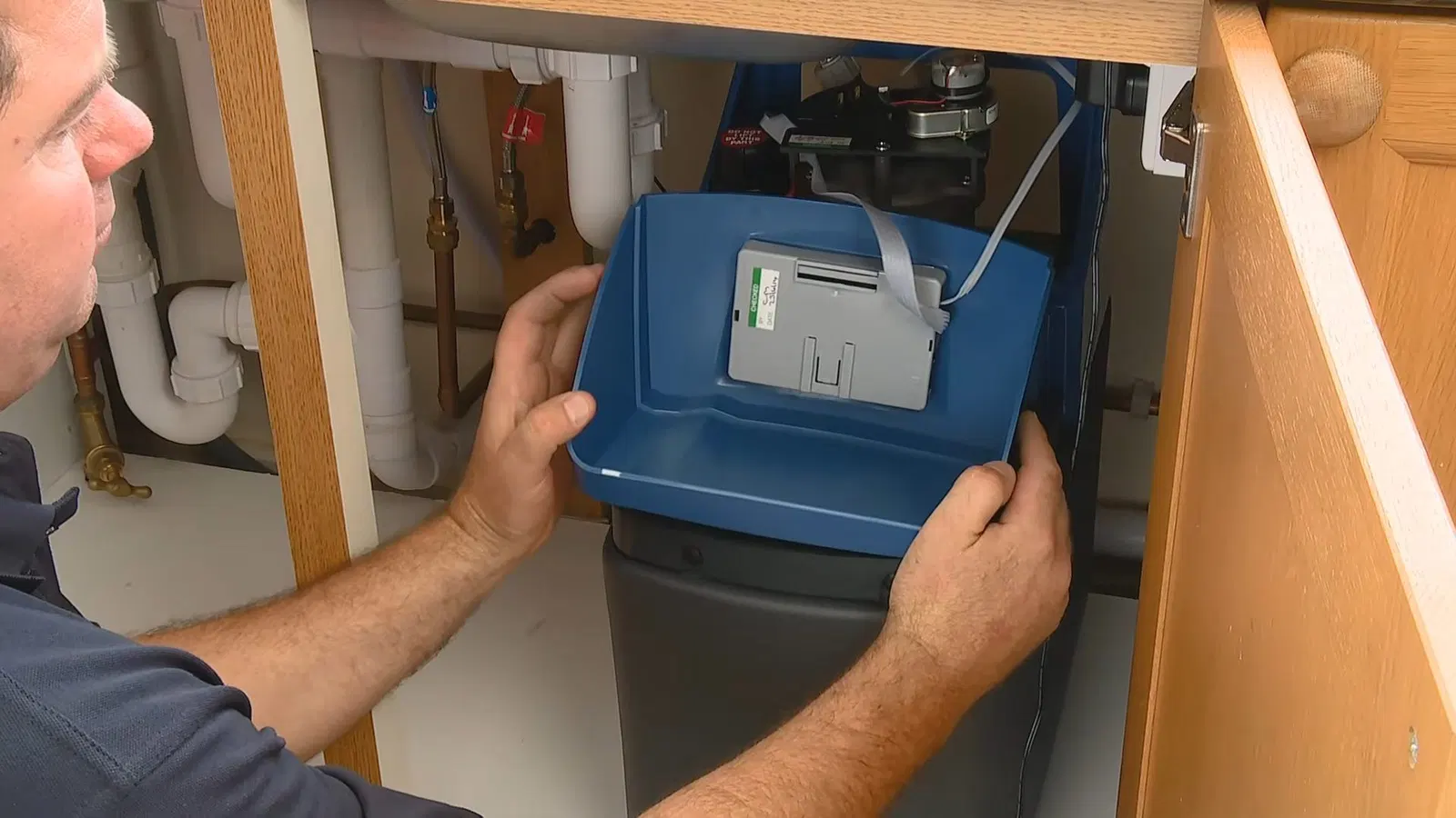 Water softener installation with focus on drain tubing