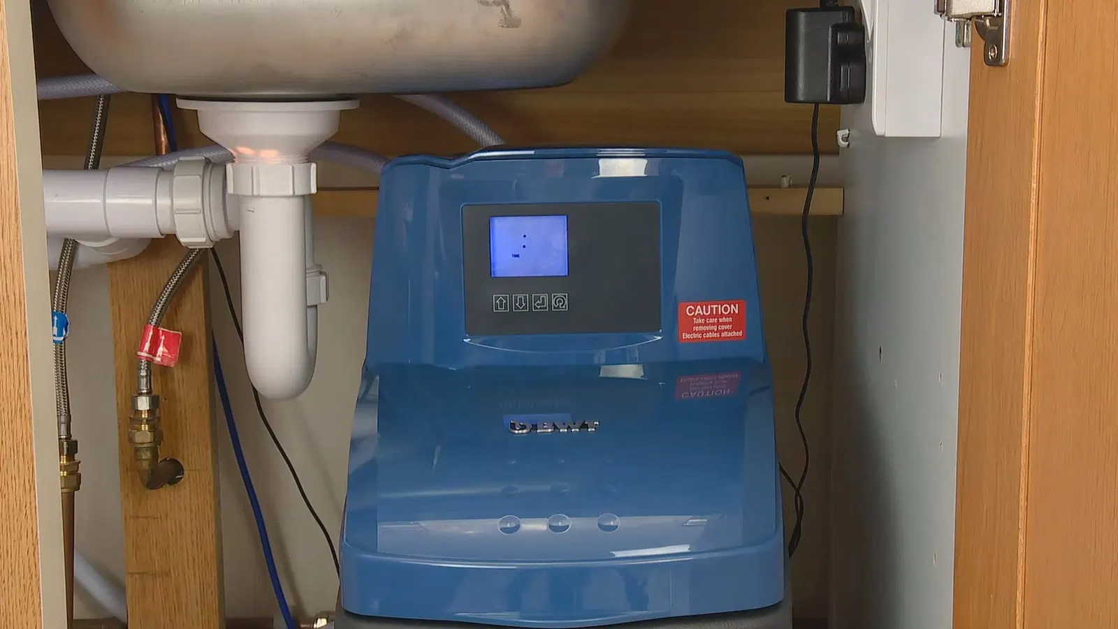 Water Softener Installation Resin Mineral Tank Plumbing service view of resin mineral tank in water softener installation